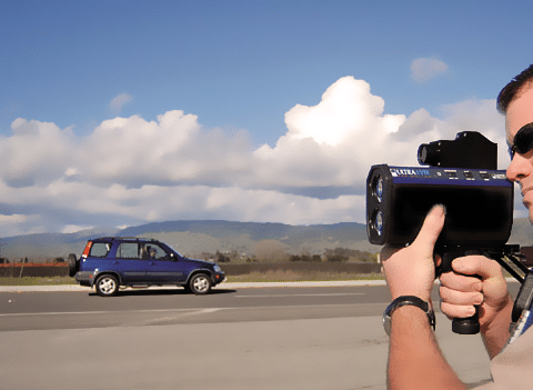cop checking speed of cars